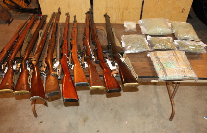 Firearms, drugs and cash