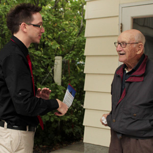 Lee Fehler speaking to Steinbach resident.