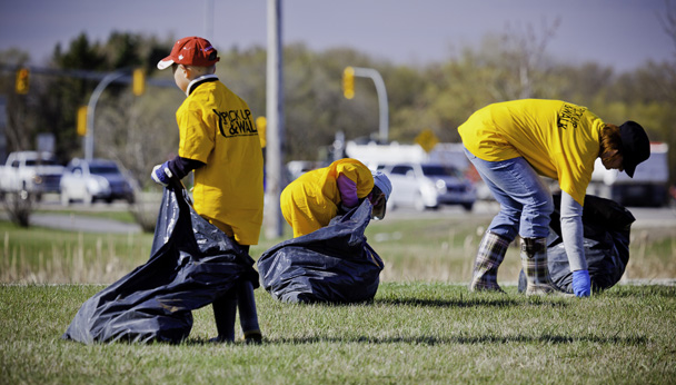 Volunteers picking up garbage Volunteers picking up garbage