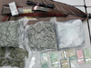 Cocaine, marijuana, cash and a firearm