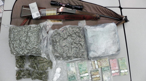 Cocaine, marijuana, cash and a firearm
