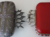 Brass knuckle purses