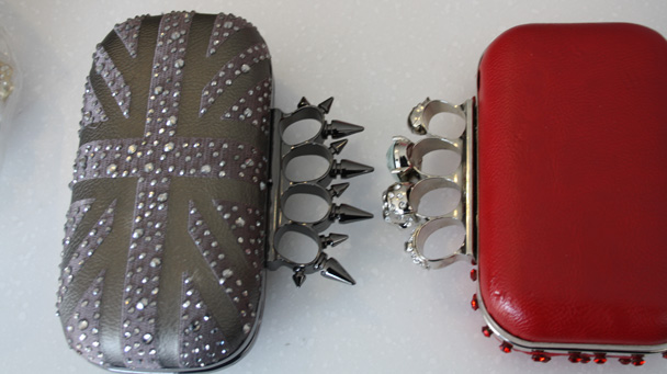 Brass knuckle purses