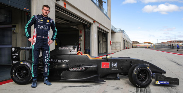 David Richert posing with Renault 2.0 prior to pre-season practice in Spain (Photo courtesy of Dutch Photo Agency)